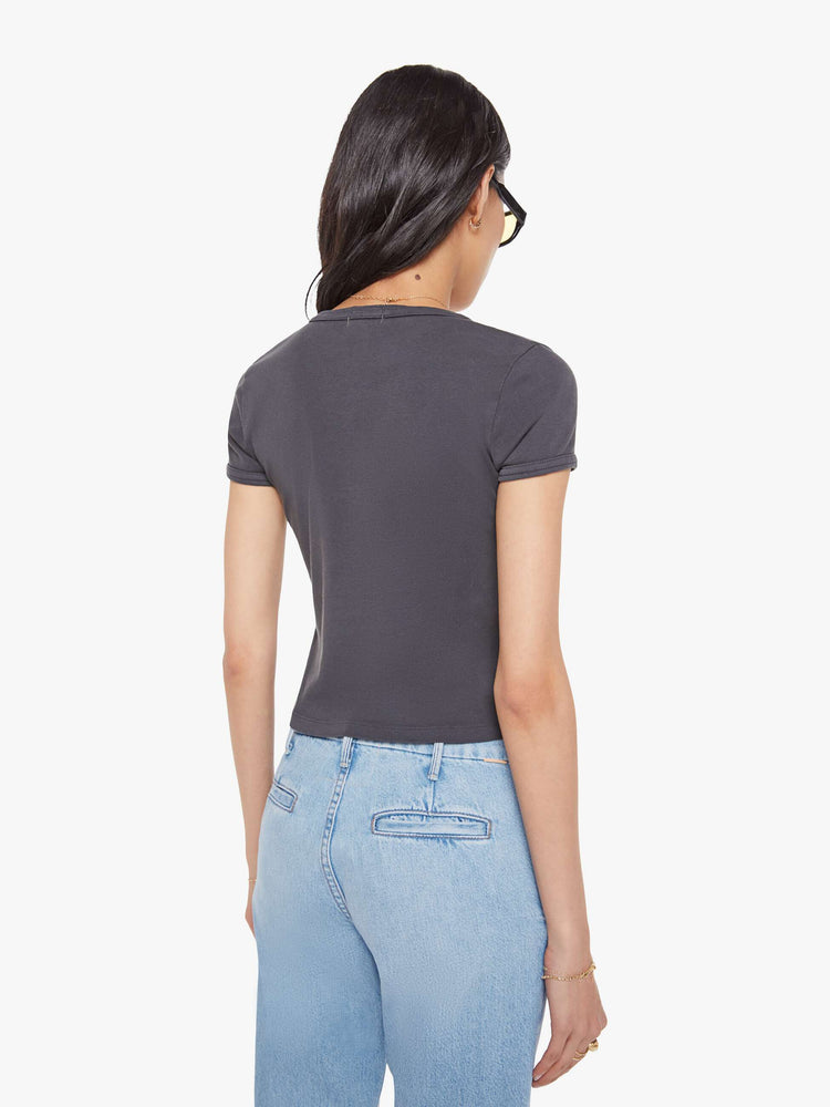 Back view of a  faded black tee with a Mini Skirts Forever features yellow text on the front.