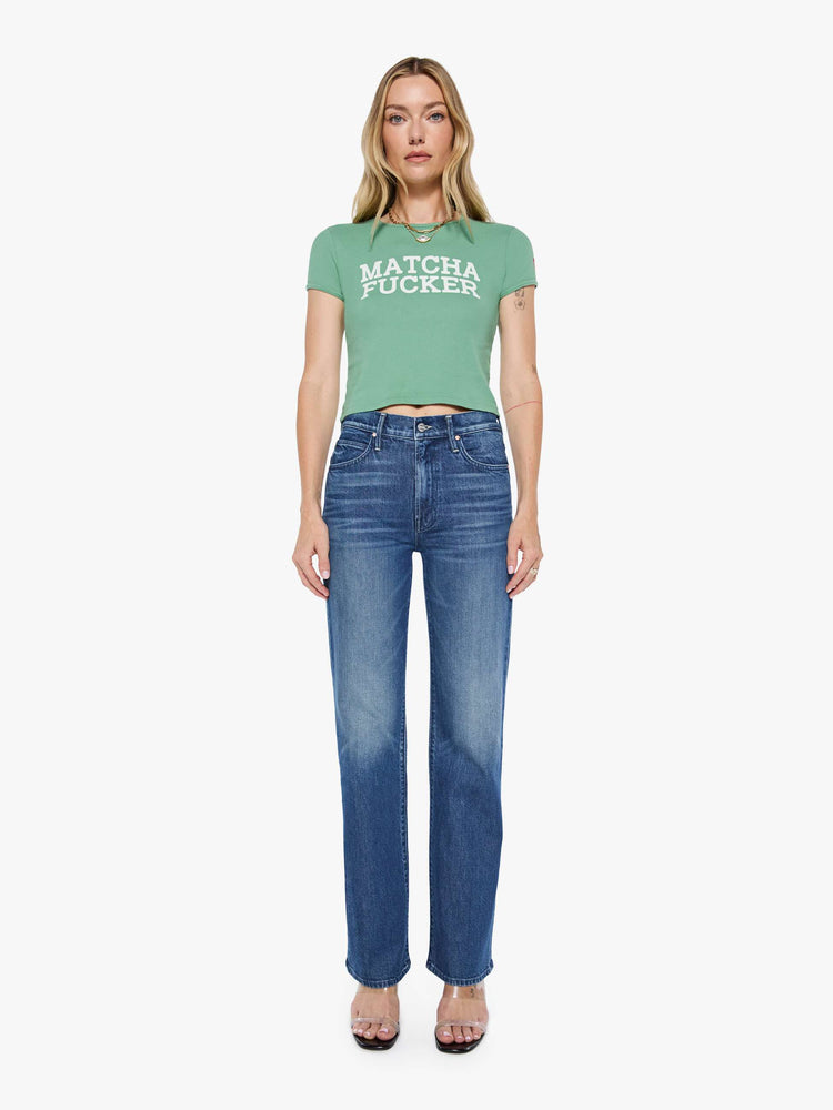 Full body view matcha green tee features an explicit text graphic in white on the front.