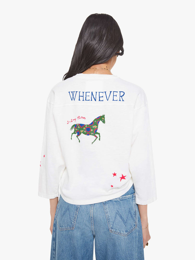 Back view of a woman in horse and flower white oversized crewneck tee is designed with drop shoulders, 3/4 sleeves and a boxy fit.