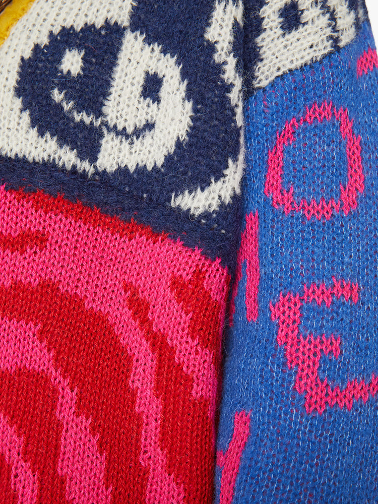 Swatch view of a woman oversized V-neck cardigan with drop shoulders, long balloon sleeves and ribbed hems in graphic smiley faces, peace signs, lightning bolts and zebra print.