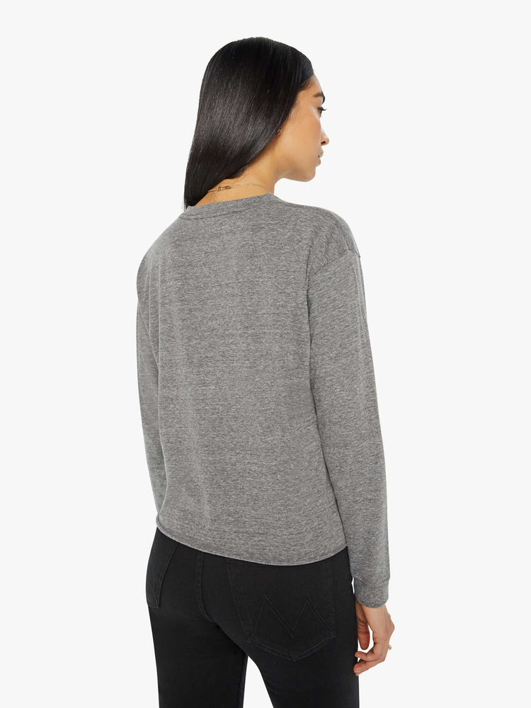 Back view of a womens long sleeve crew neck tee in a heather grey.