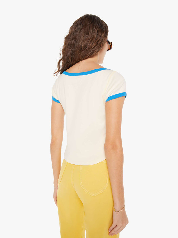 Back view of a woman in a baby tee designed with a deep scoop neck, short sleeves, a slim fit and a cropped, curved hem.