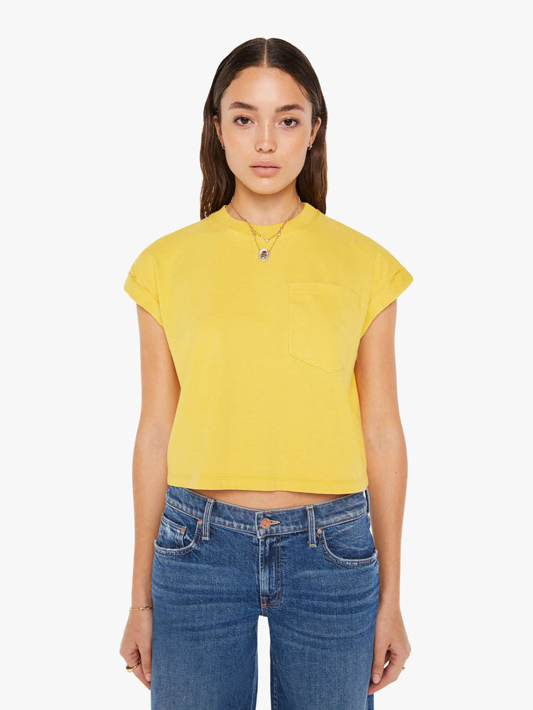 Front view of a womens crew neck tee in yellow featuring a cropped body and front chest pocket.