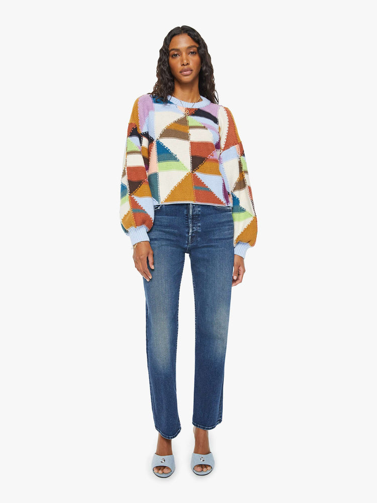 Front full body view of a womens multi color block sweater featuring a cropped body and billow sleeves.
