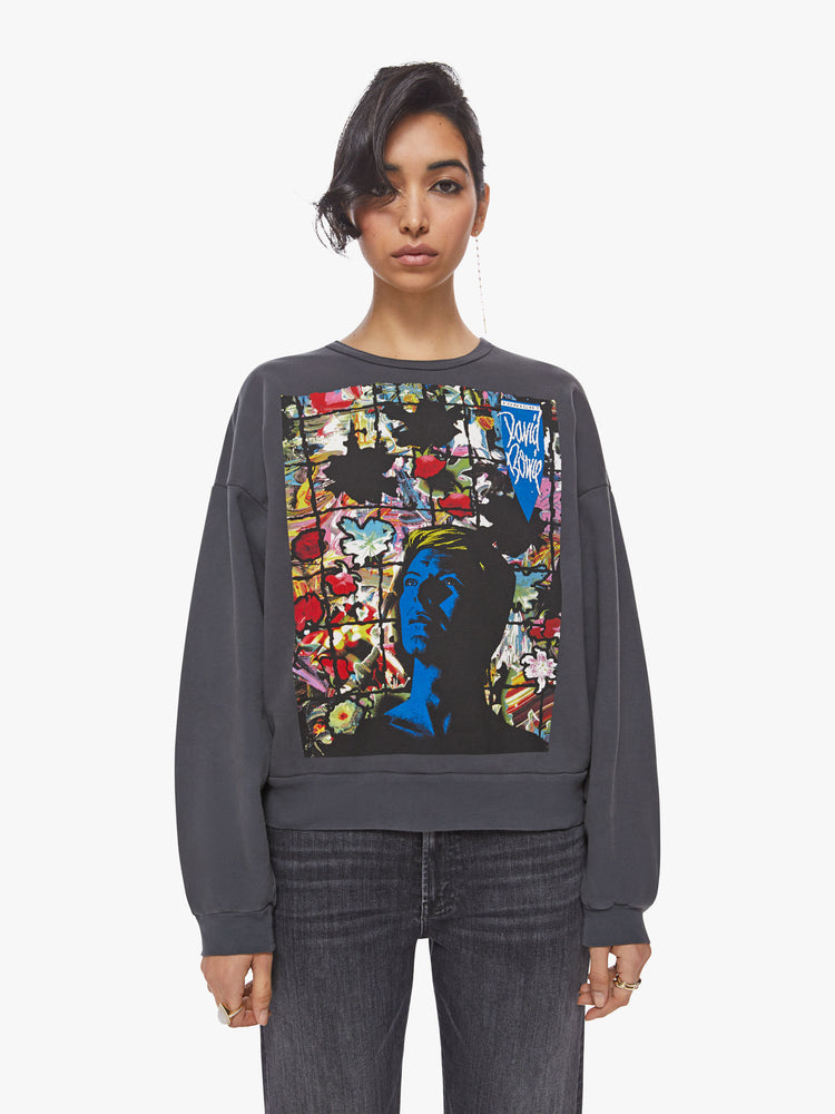 Front view of a woman crewneck sweatshirt which pays tribute to the superstar’s 1983 Serious Moonlight Tour with drop shoulders and a relaxed fit, and original cover art.