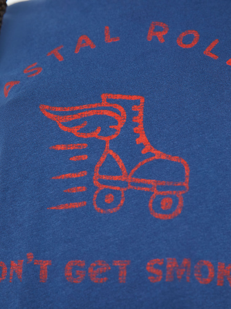 Swatch view of a woman crewneck with a slim fit in a dark navy, the tee features a roller-skate graphic with text in red on the front.