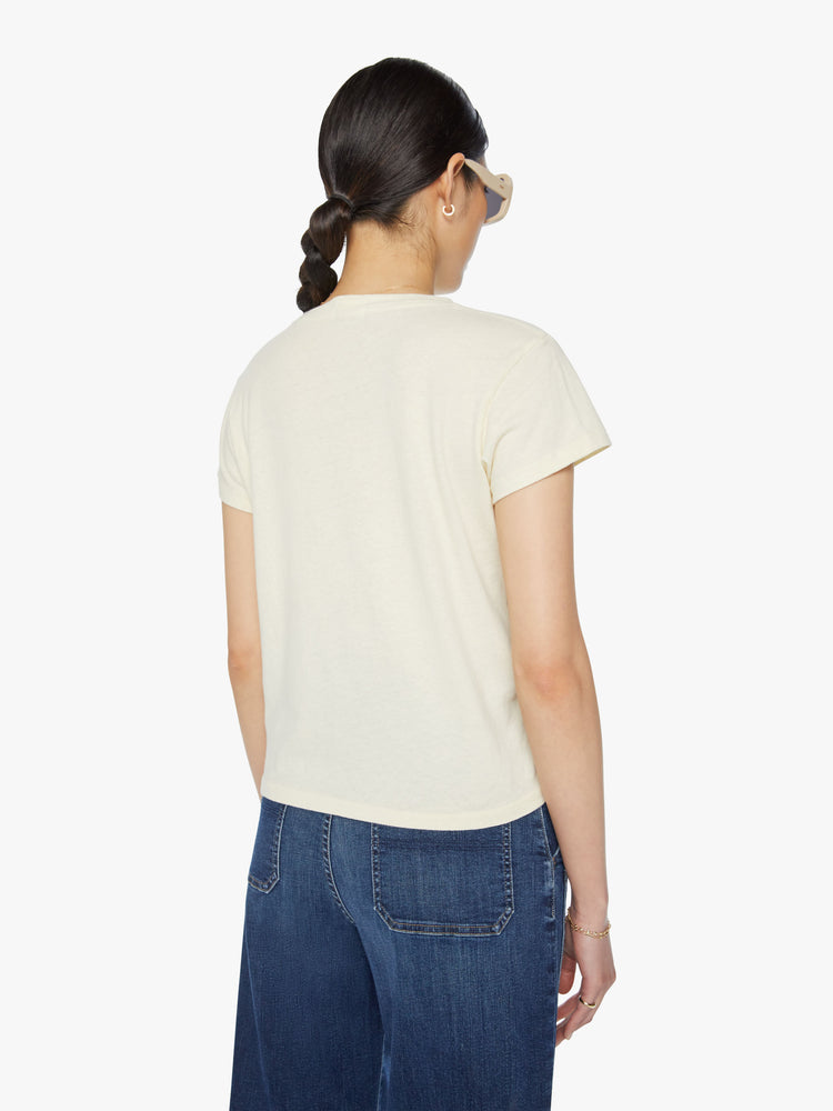 Back view of a woman off white with faded green graphic horses crewneck slit fit tee.