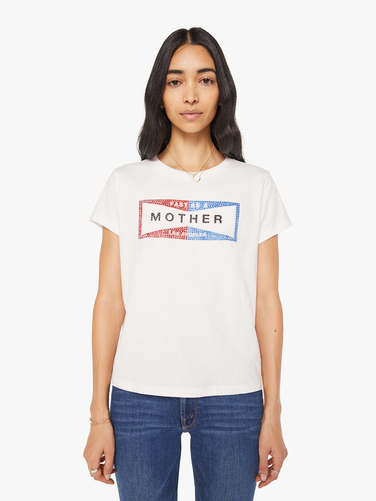 Front view of a woman in a faded red and blue graphic embellished with metallic rhinestones and MOTHER across the front white crewneck tee.