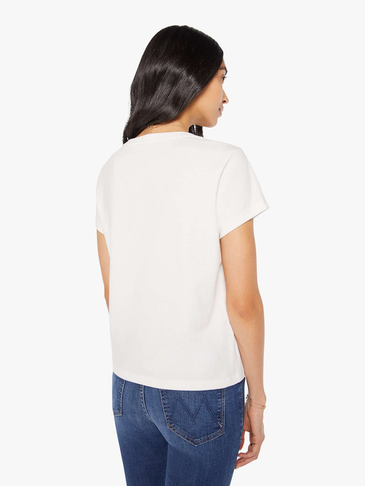 Back view of a woman in a faded red and blue graphic embellished with metallic rhinestones and MOTHER across the front white crewneck tee.