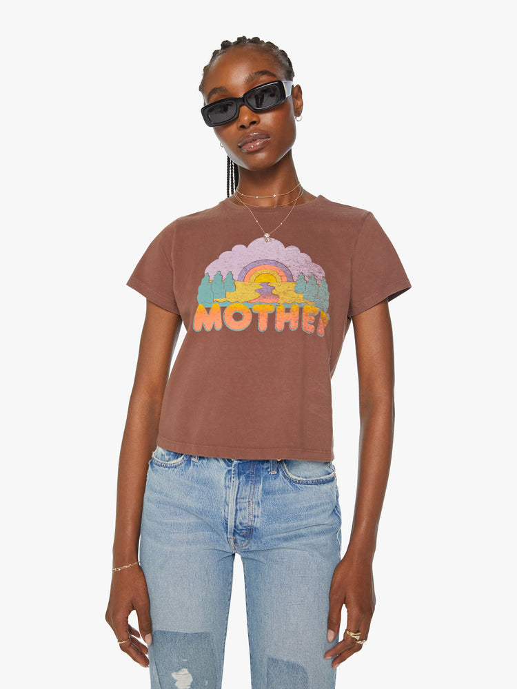 Front view of a woman brown crewneck with a slim fit in a faded graphic sunset.