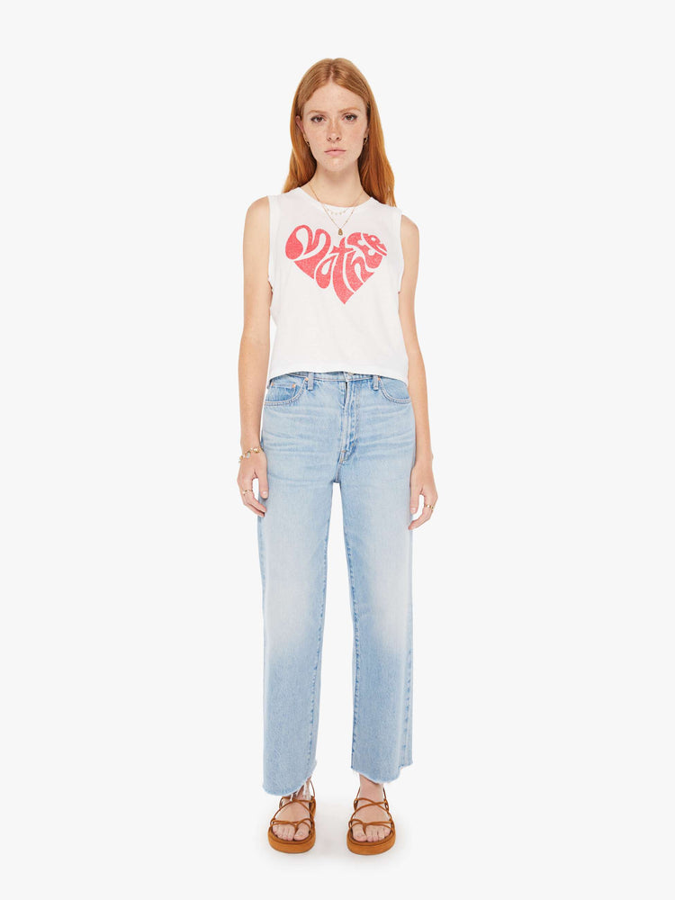 Front full body view of a womens white tank featuring a MOTHER heart graphic in red.