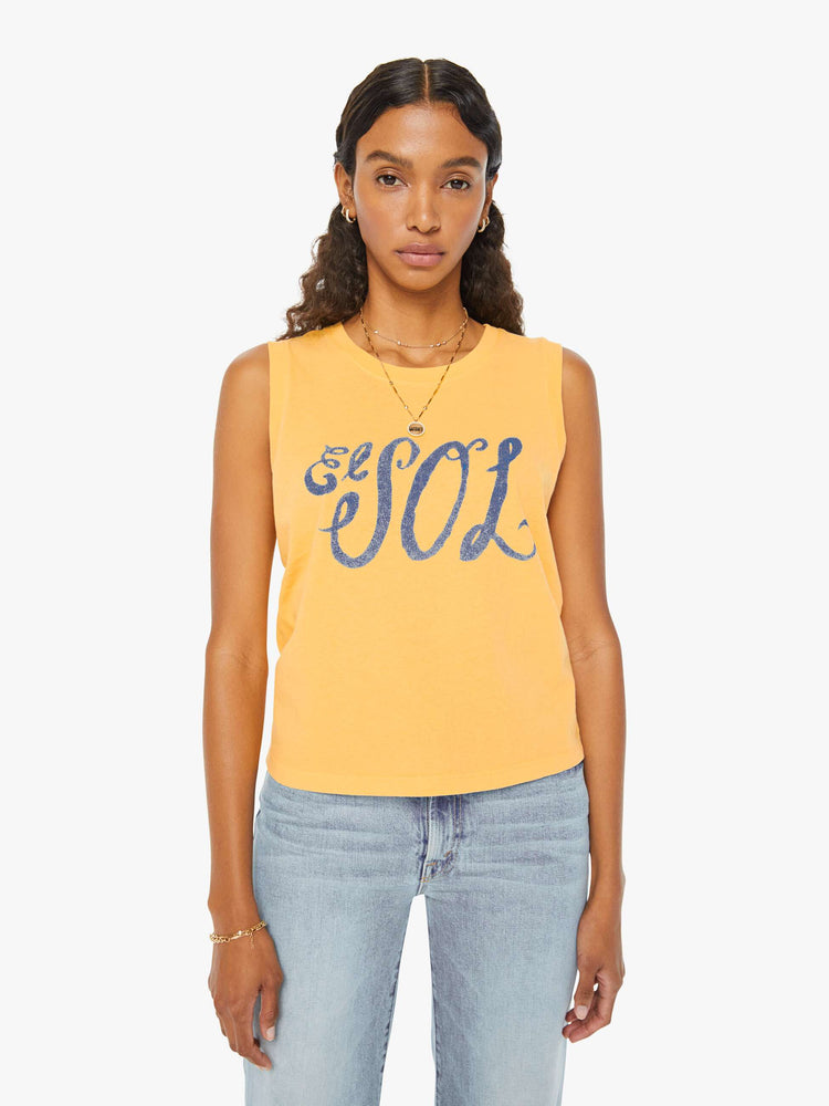 Front view of a woman in a yellow cropped muscle tee that features "El Sol" text in blue.