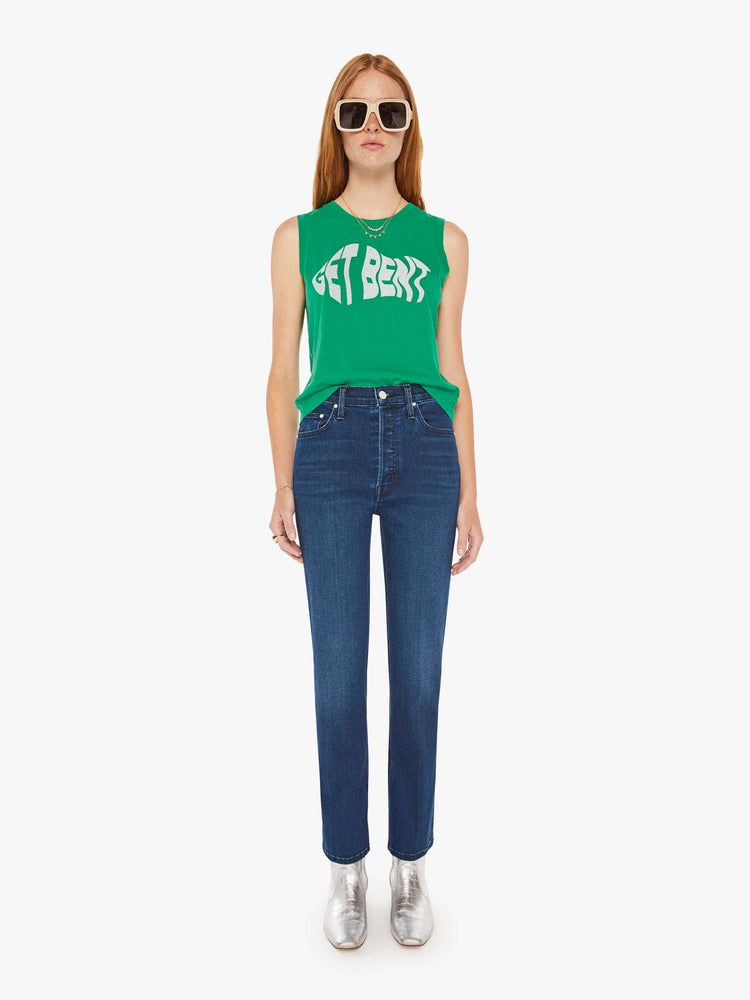 Full body view of a woman green cropped muscle tee with a crewneck and boxy fit.