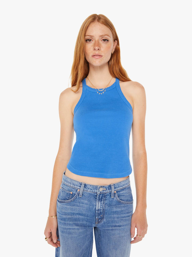 Front view of a woman in a royal blue tank features a slim fit, racer-style straps that cross in the back and a slightly curved hem.