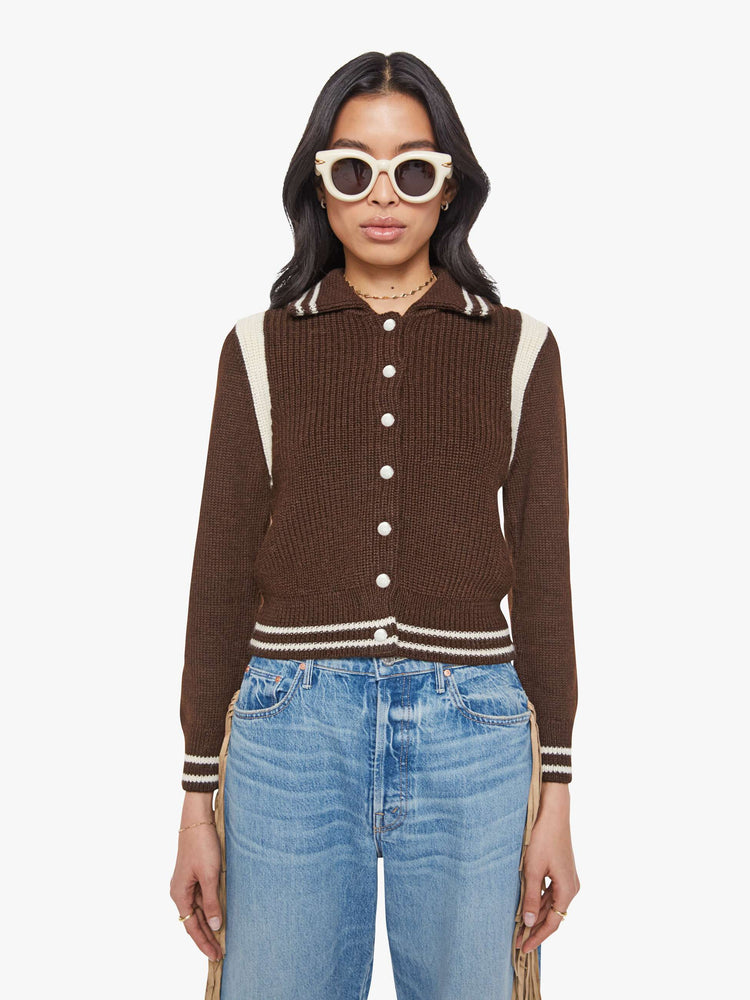 Front view of a chocolate  collared knit top with long sleeves, buttons down the front, ribbed hems and a slightly shrunken fit. 