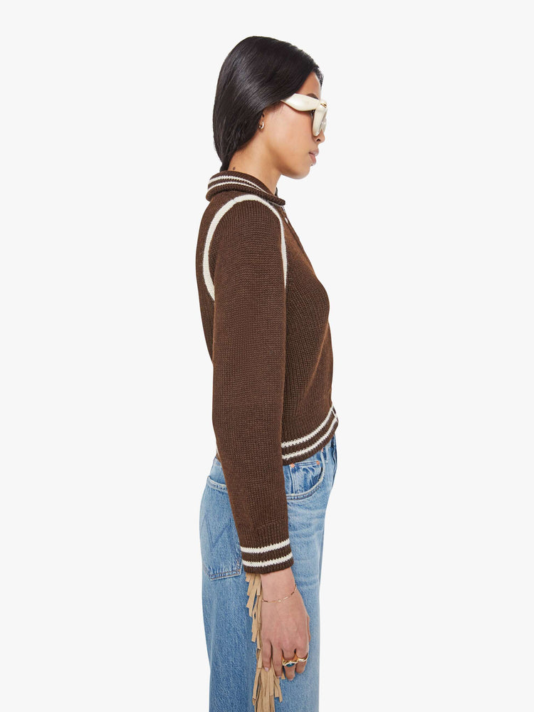 Side view of a chocolate  collared knit top with long sleeves, buttons down the front, ribbed hems and a slightly shrunken fit. 