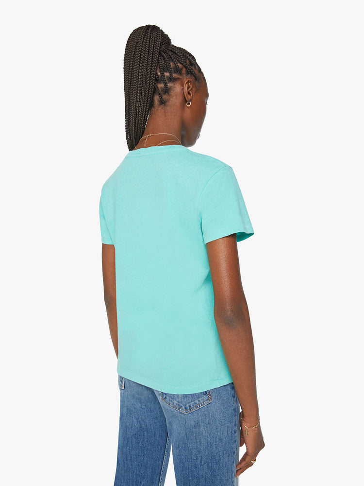 Back view of a woman aqua blue tee featuring a faded text graphic with a bull on the front.
