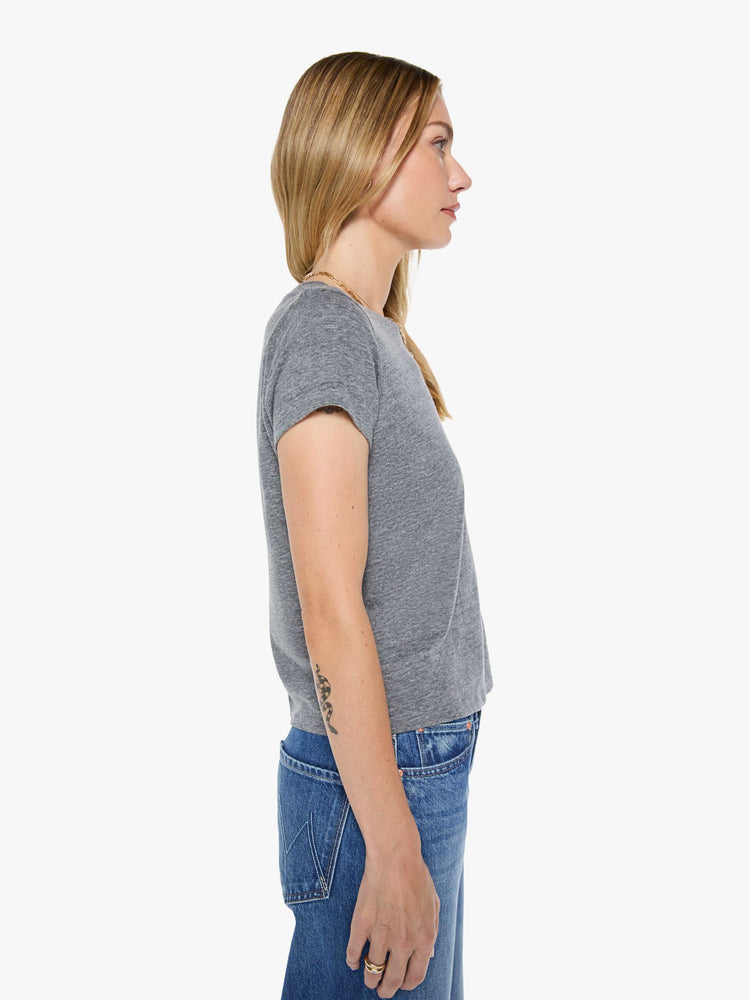 Side view of a womens heather grey crew neck tee featuring a slim fit.