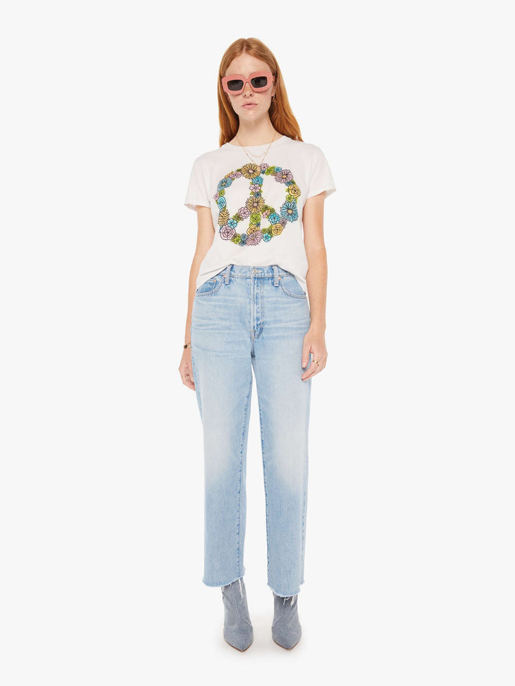 Front full body view of a white crew neck tee featuring a peace sign made of flowers.