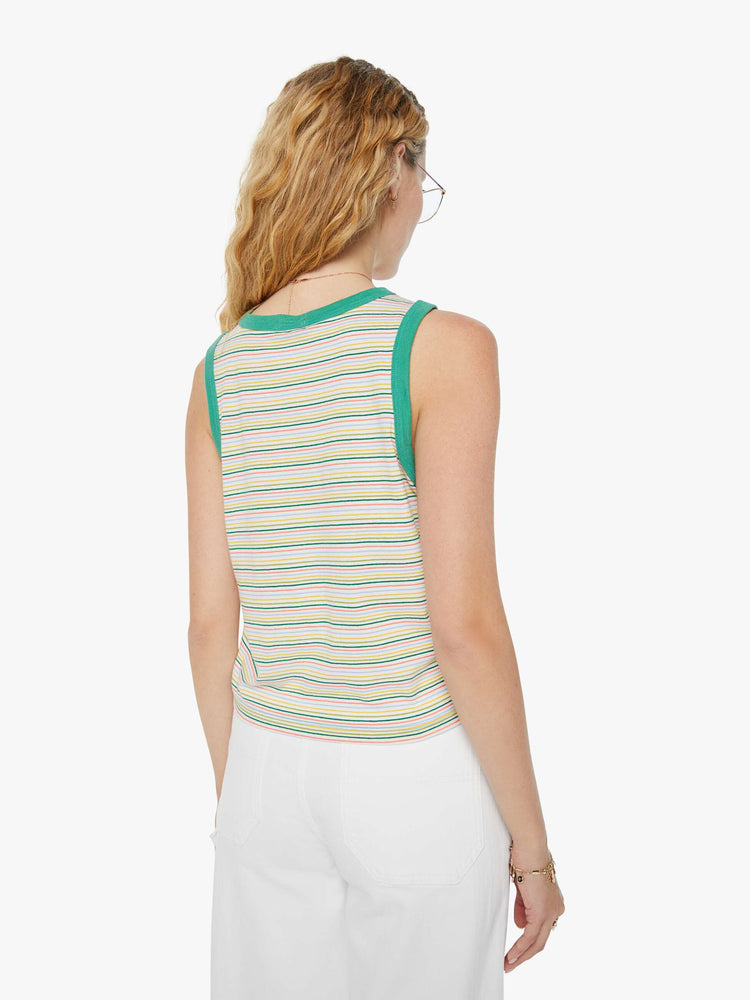 Back view of a woman in a green multi-colored horizontal striped cropped muscle tee with a crewneck, patch pocket and boxy fit.