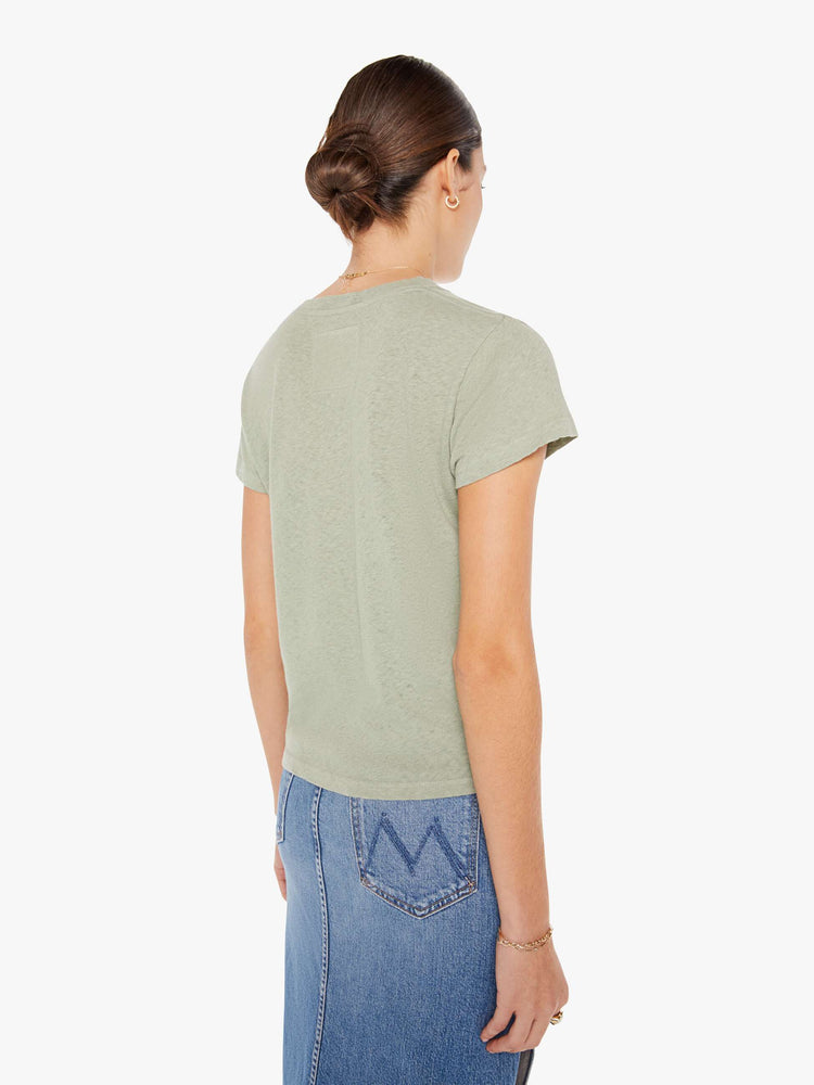 Back view of a faded green crew neck tee.