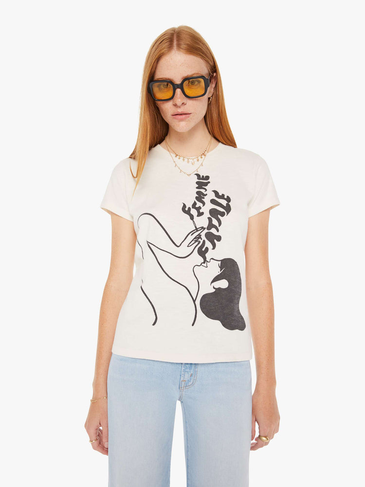 Front view of a womens white crew neck tee featuring a large black graphic of a smoking woman and the words "FEMME FATALE".