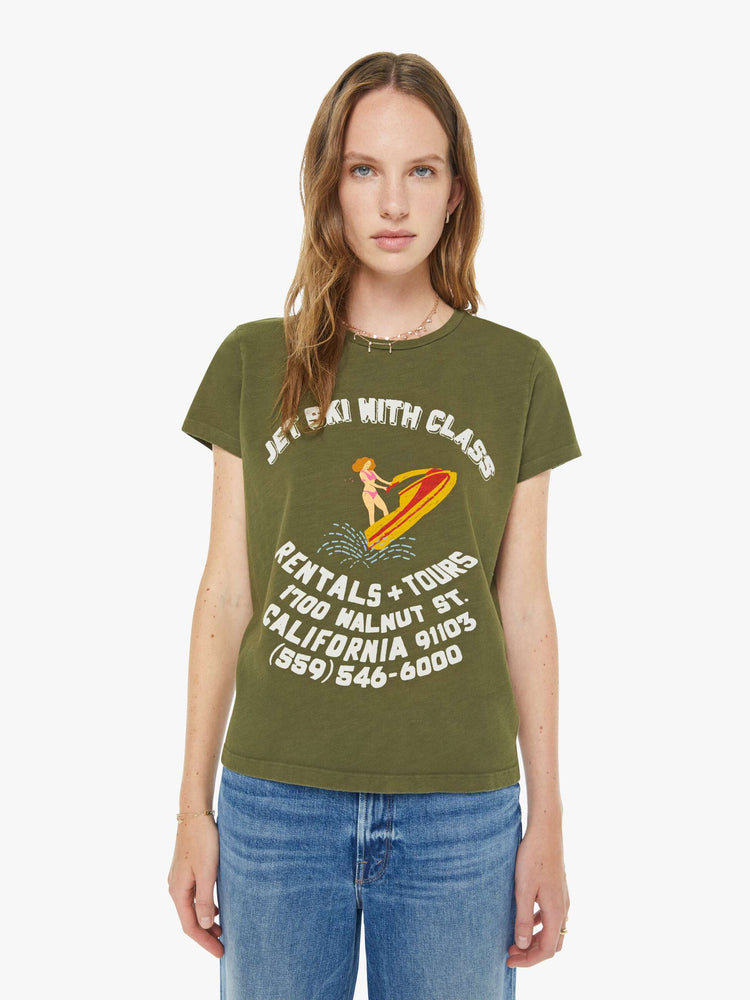 Front view of a woman in an olive green, the tee with a jets ski school graphic with text in white on the front.