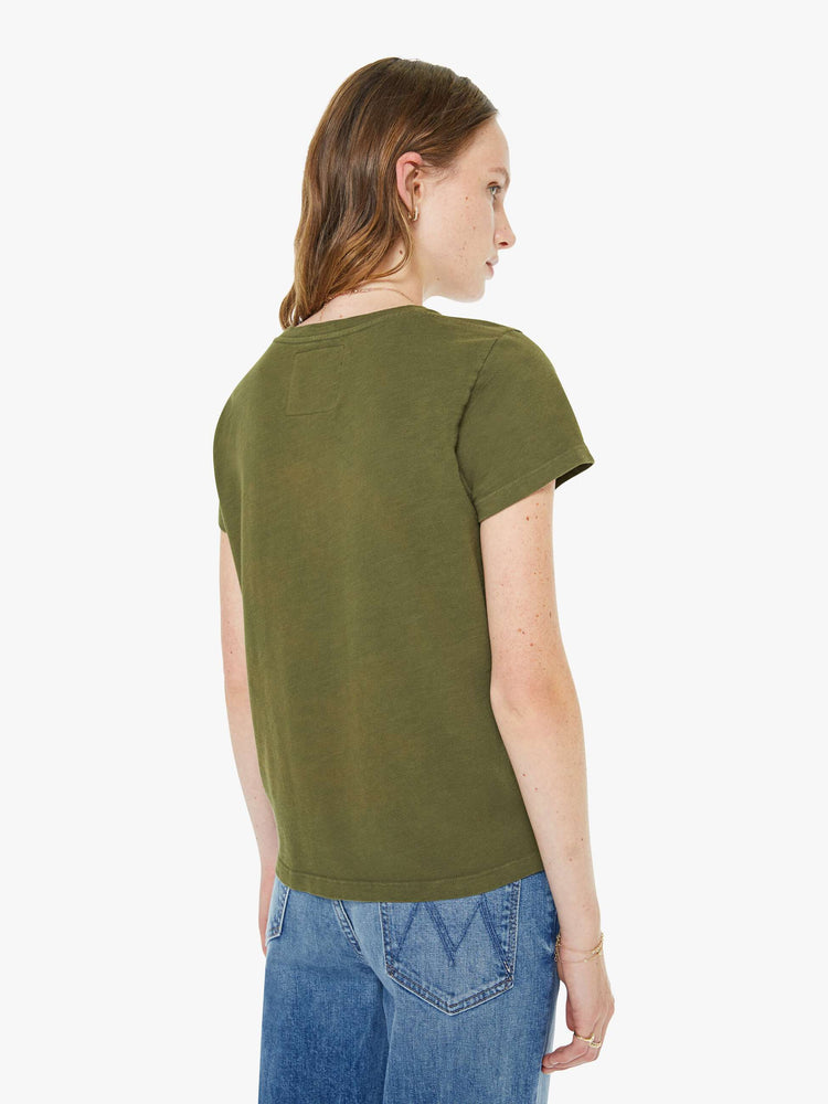 Back view of a woman in an olive green, the tee with a jets ski school graphic with text in white on the front.
