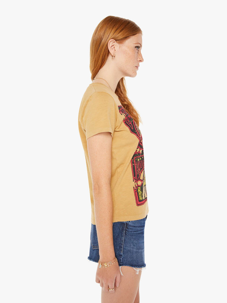 Side view of a womens crew neck tee featuring a large vintage inspired graphic.