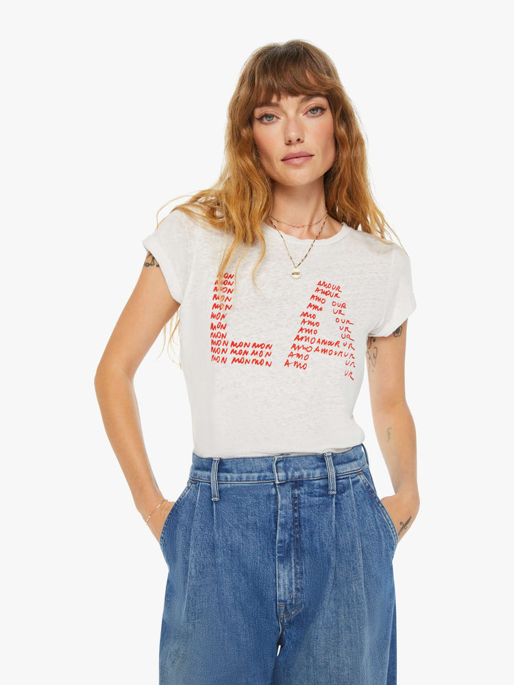 Front view of a woman slim fit white tee with a red text graphic on the front.
