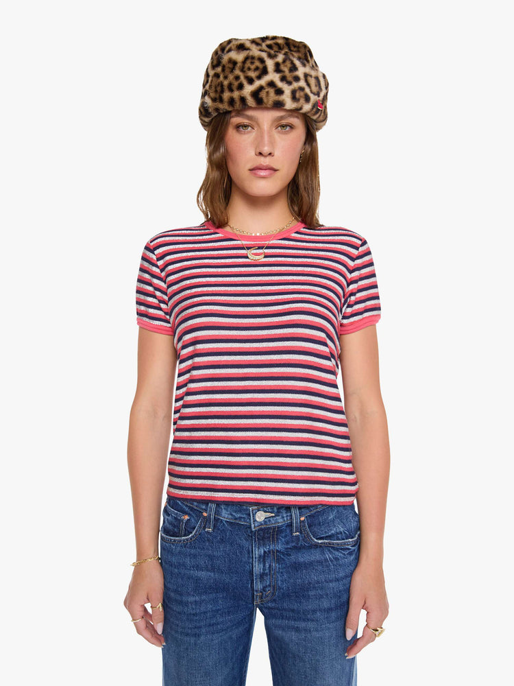 Front view of a woman in a hot pink, navy and glittery silver horizontal stripes tee with extra-short sleeves.