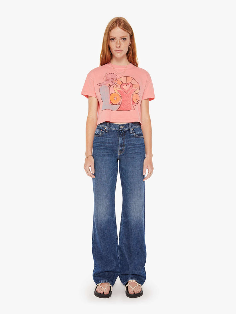 Front full body view of a womens pink crew neck tee featuring a cropped body and a LOVE with Cupid graphic.