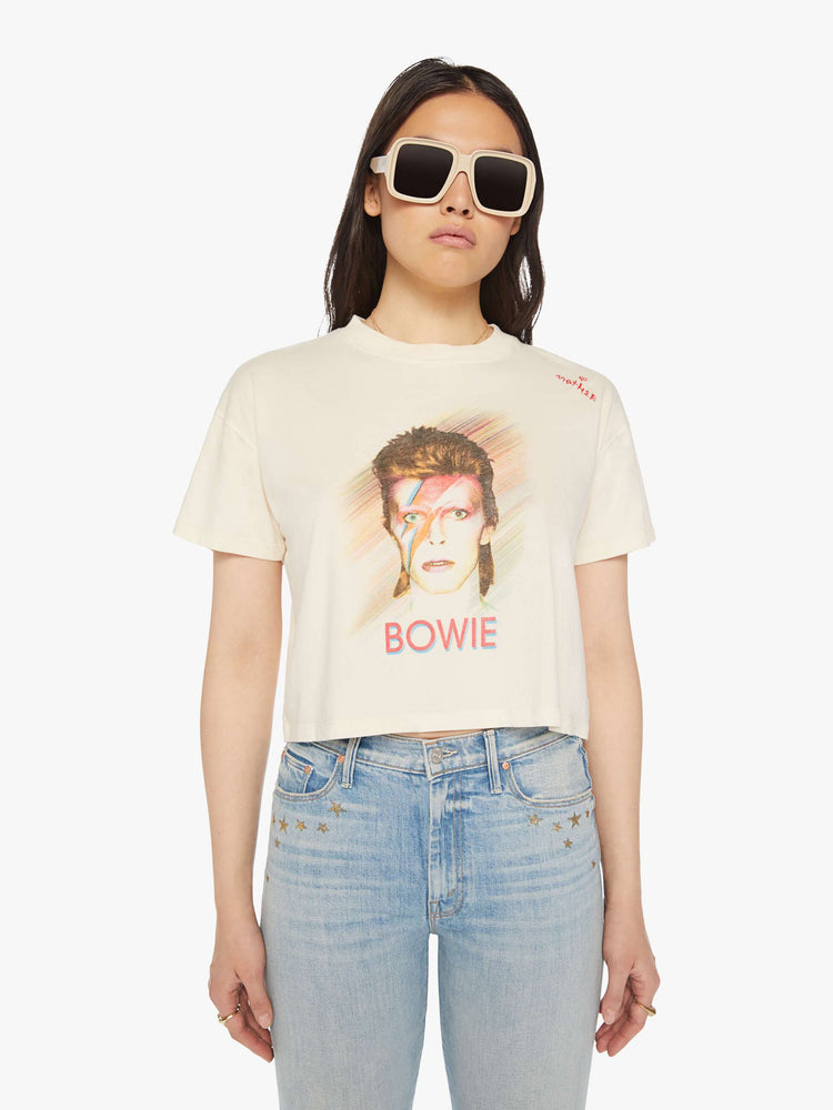 Front view of a womens cropped tee featuring a BOWIE graphic and embroidered details.