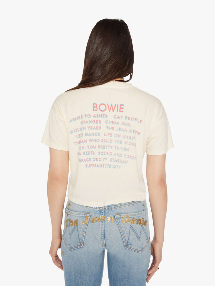 Back view of a womens cropped tee featuring a BOWIE graphic at the back.