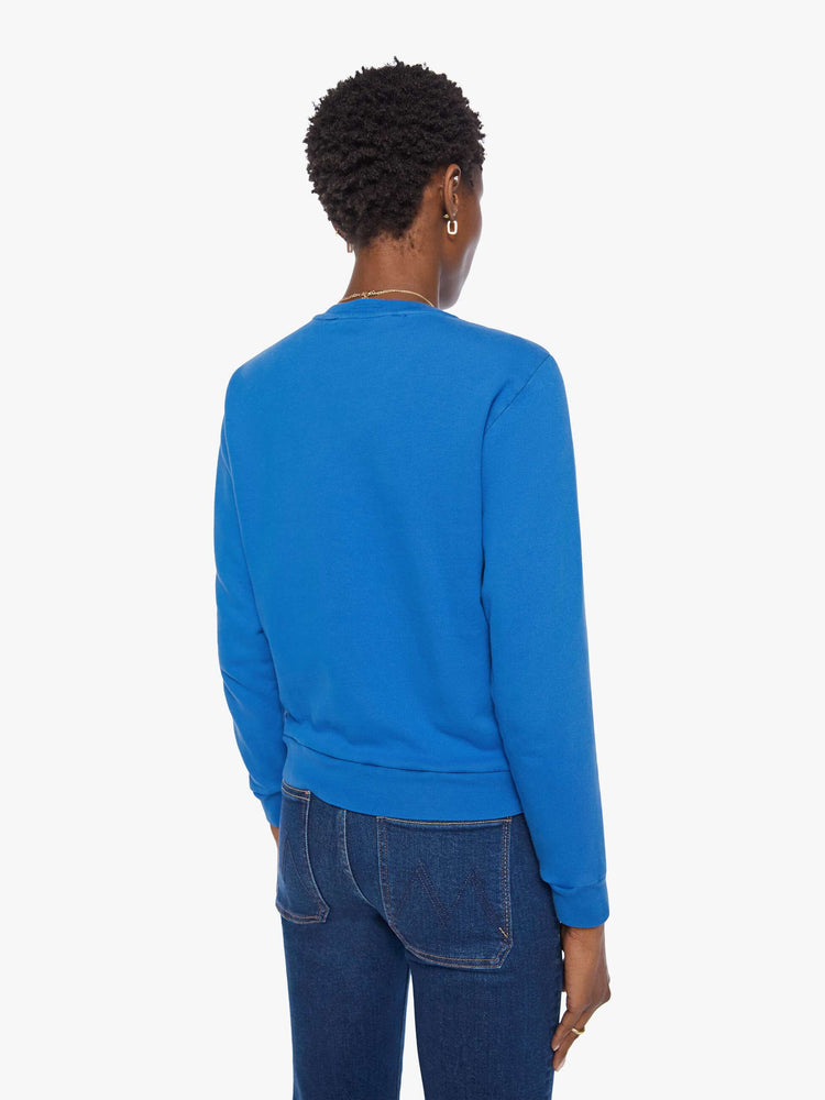 Back view of a woman in a  bright blue with MOTHER's name in red across the chest crewneck sweatshirt with ribbed hems and a loose, comfortable fit.