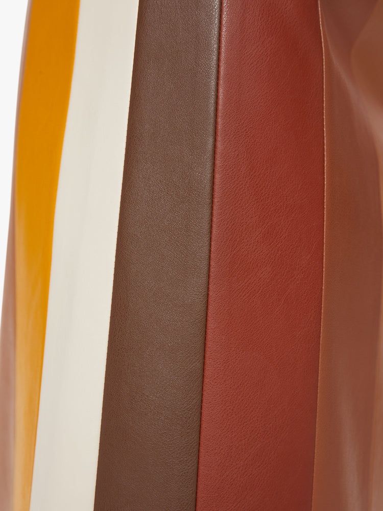 Swatch view of a woman colorblocked midi skirt with a high rise, loose fit and a calf-grazing hem in a faux leather.
