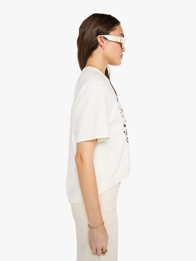 WOMAN side view in a  white top with a MOTHER's spin on the classic Amoeba Music logo in black on the front.