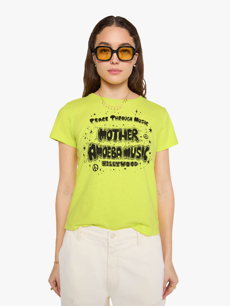 Front view of a woman in a lime green top features MOTHER's spin on the classic Amoeba Music logo in black on the front.