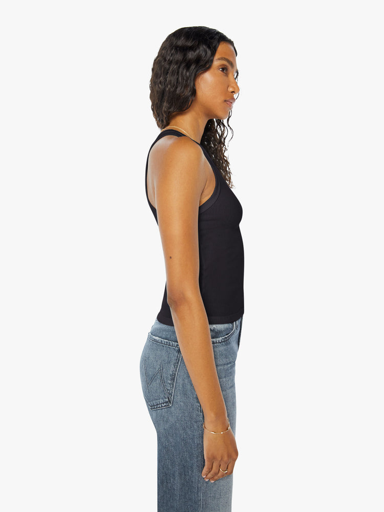 Side view of a womens black ribbed tank top.