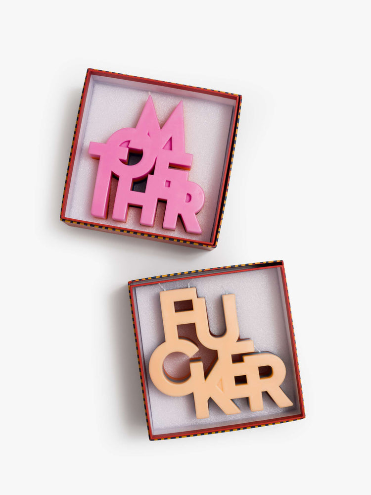 A set of two three-wick candle made from a blend of soy wax and beeswax in beige, blue and orange.