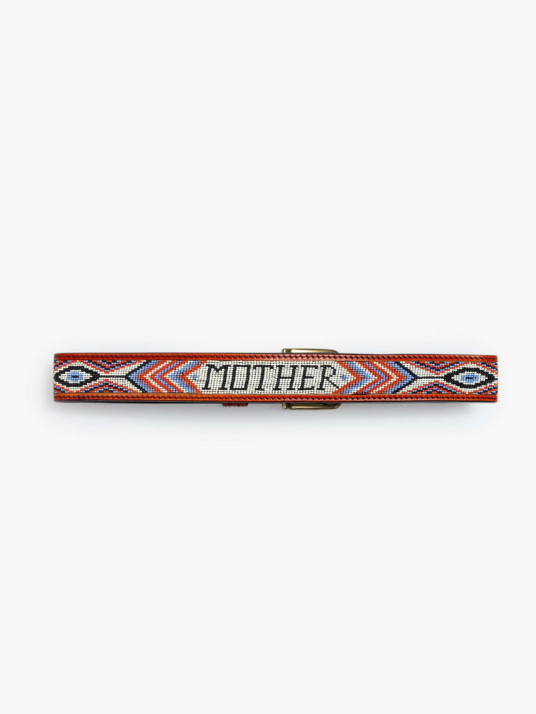 Back flat view of a vintage-inspired leather belt with embossed and beaded details. 