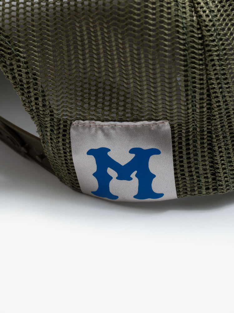 Flat view in a vintage-inspired hat designed in camo featuring a patch with MOTHER's name on the front.