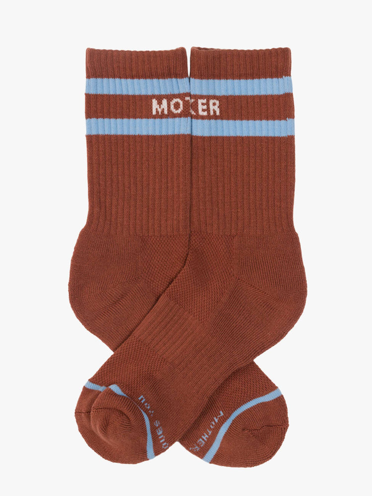 Flats view of Flats vintage-inspired tube socks in brown with baby blue stripes and white lettering.