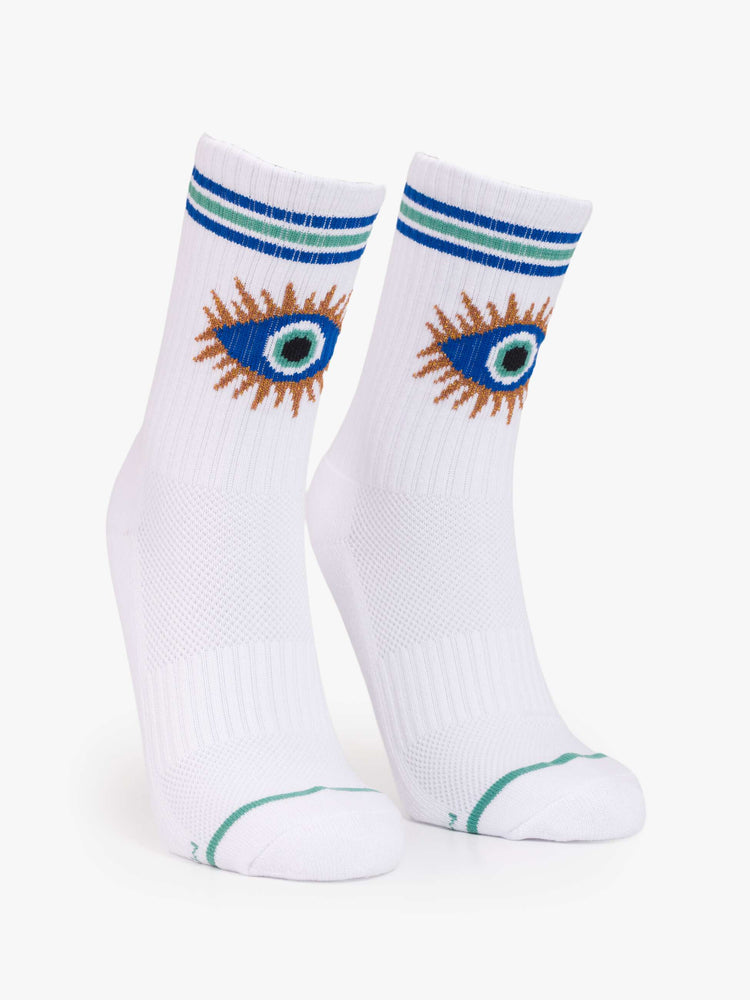 Flat view of tube socks designed in white with a blue eye on the front and stripe detailing.
