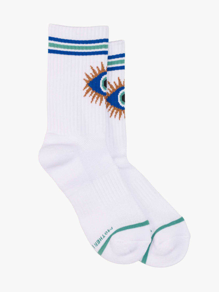 Flat side view of tube socks designed in white with a blue eye on the front and stripe detailing.