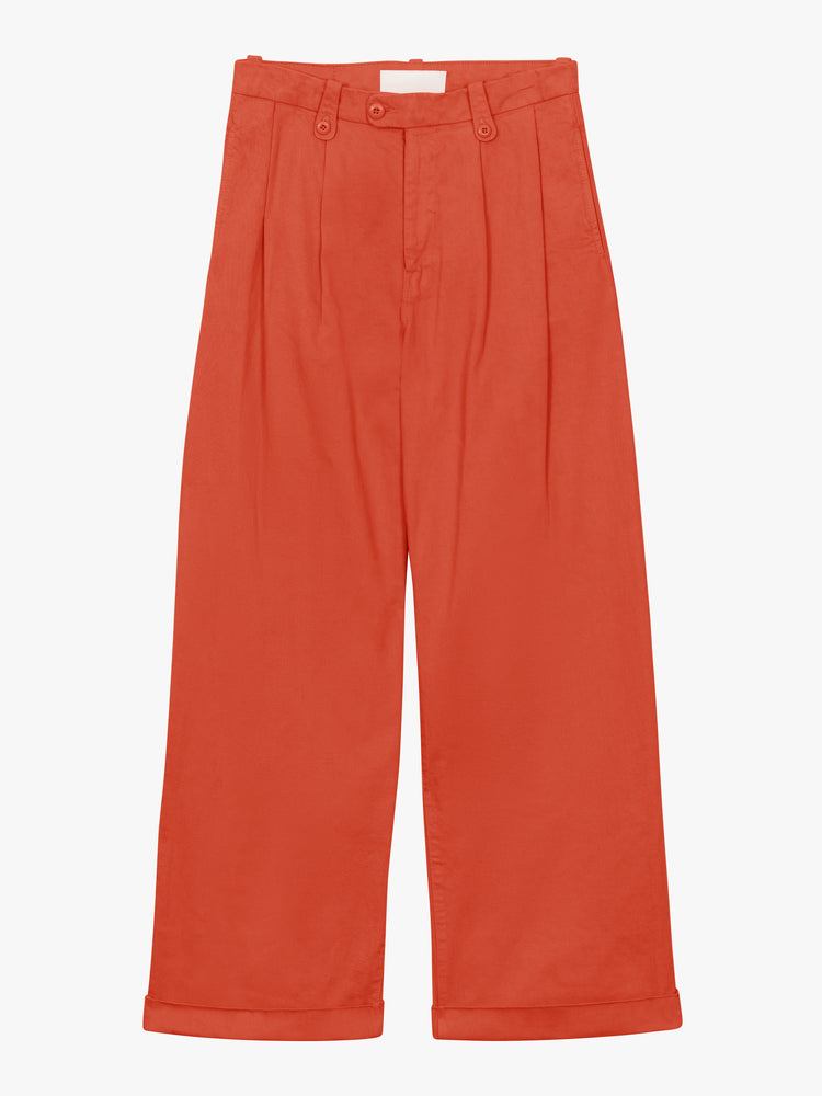 Flat view of a coral pant with pleats and wide cuffed hem.