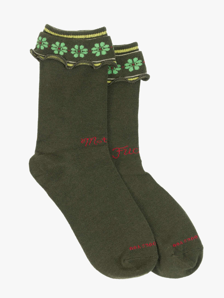 Flat style view of forest green with lime-green flowers socks with yellow and white stripes and text in red across the front.