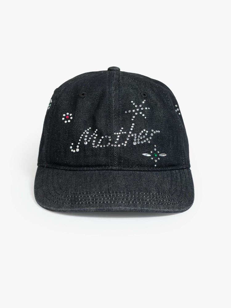 Flat view of a dad hat designed in a faded black 100% cotton denim with MOTHER's name in rhinestones on the front.