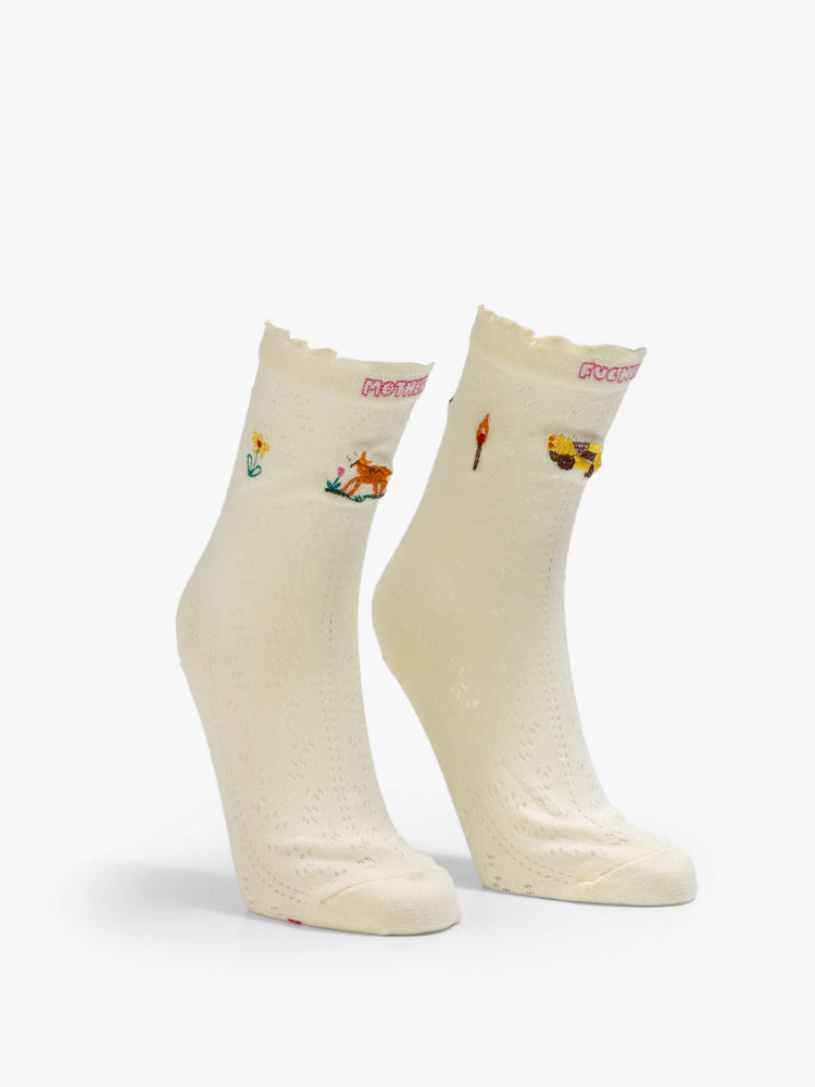 Front view of white  tube socks with a message from MOTHER with colorful embroidery throughout.
