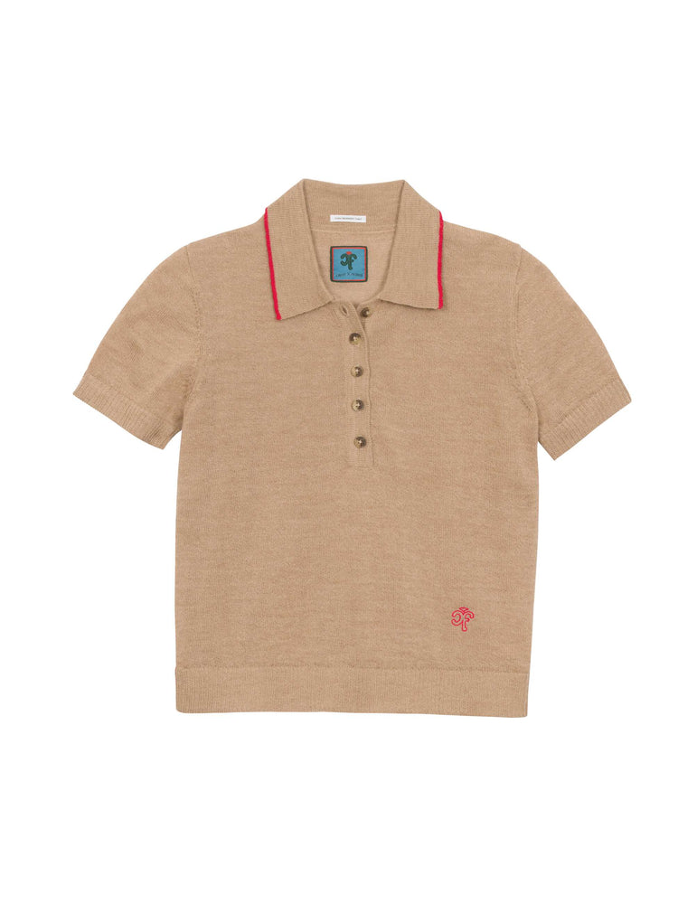 Flat product image of a knit short sleeve polo in a khaki brown with red trim.
